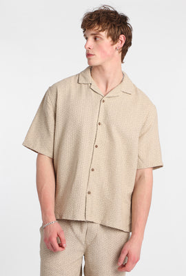 Chemise boutonnée texturée à motif géométrique