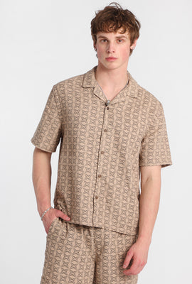 Chemise boutonnée texturée à motif floral géométrique