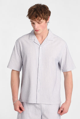 Chemise boutonnée texturée à fines rayures