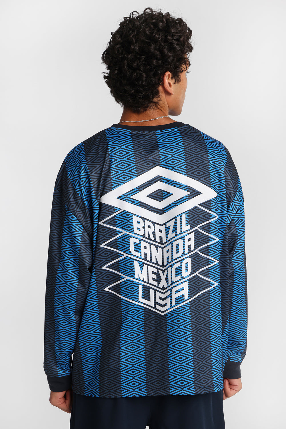 Umbro World's Game Graphic Long Sleeve Crew Neck Jersey Umbro World's Game Graphic Long Sleeve Crew Neck Jersey