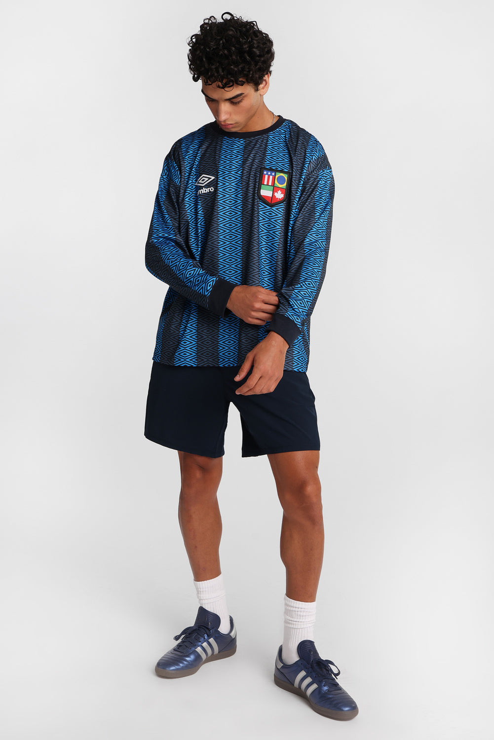 Umbro World's Game Graphic Long Sleeve Crew Neck Jersey Umbro World's Game Graphic Long Sleeve Crew Neck Jersey