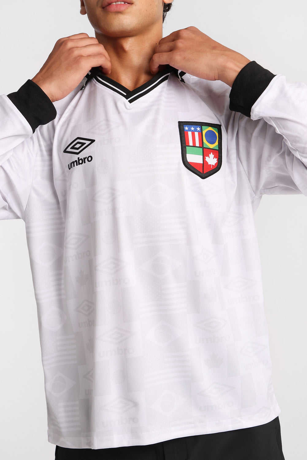 Maillot polo à manches longues Umbro World's Game Maillot polo à manches longues Umbro World's Game