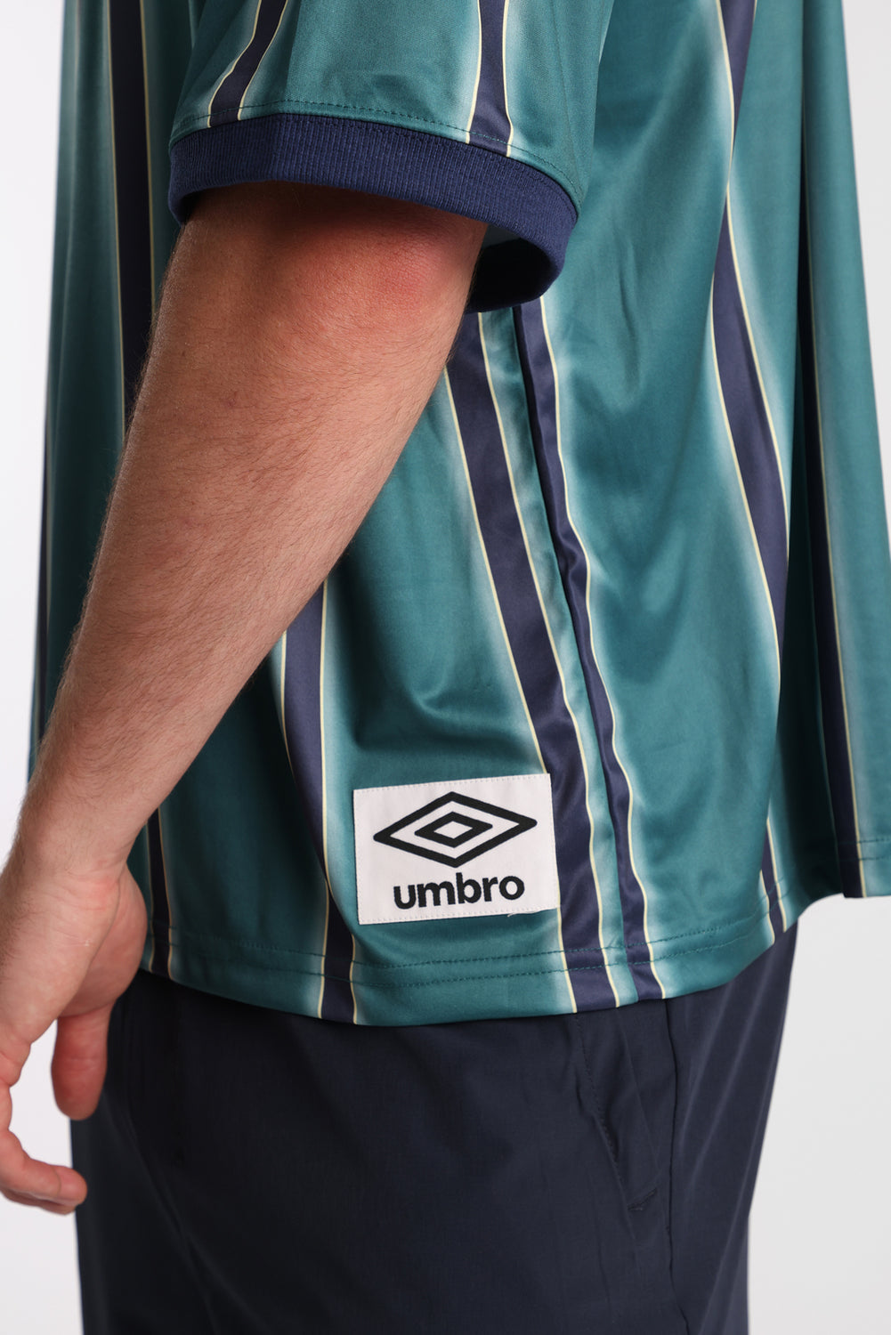 Umbro Large Logo Striped Tee Umbro Large Logo Striped Tee