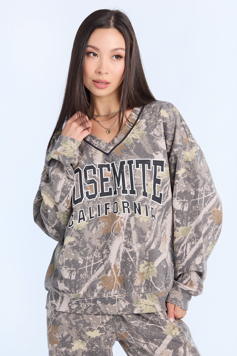 Graphic V-Neck Sweatshirt Graphic V-Neck Sweatshirt
