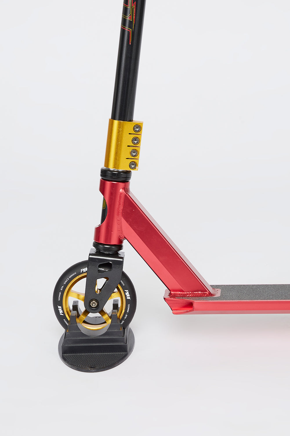 Trottinette X-Park rouge et dorée Pivot Trottinette X-Park rouge et dorée Pivot