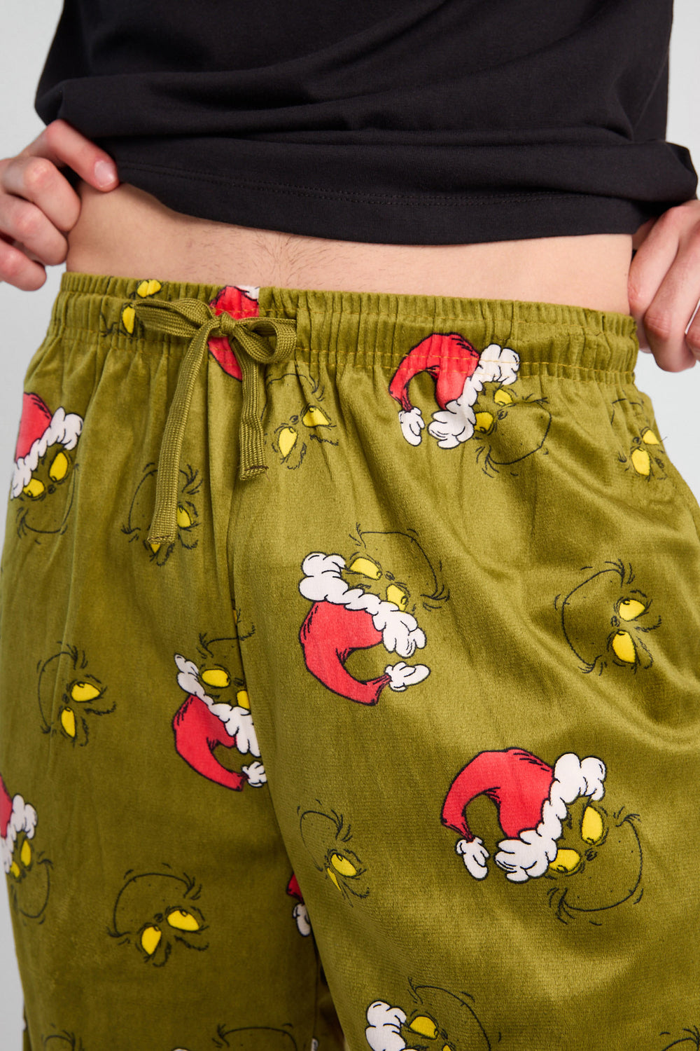 Pantalon de pyjama à imprimé de visages Le Grinch Pantalon de pyjama à imprimé de visages Le Grinch